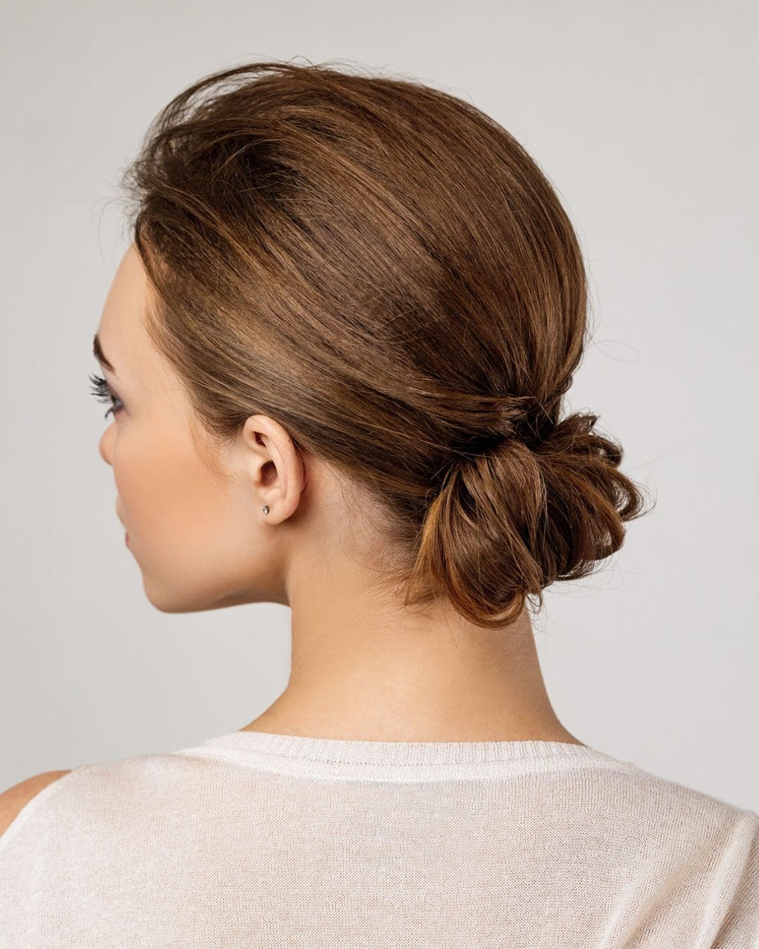 Image of Messy bun hairstyle for 3 day hair